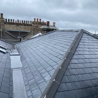 Slate roofing with lead valley work