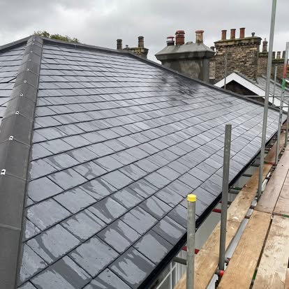 Slate hip roof on period property